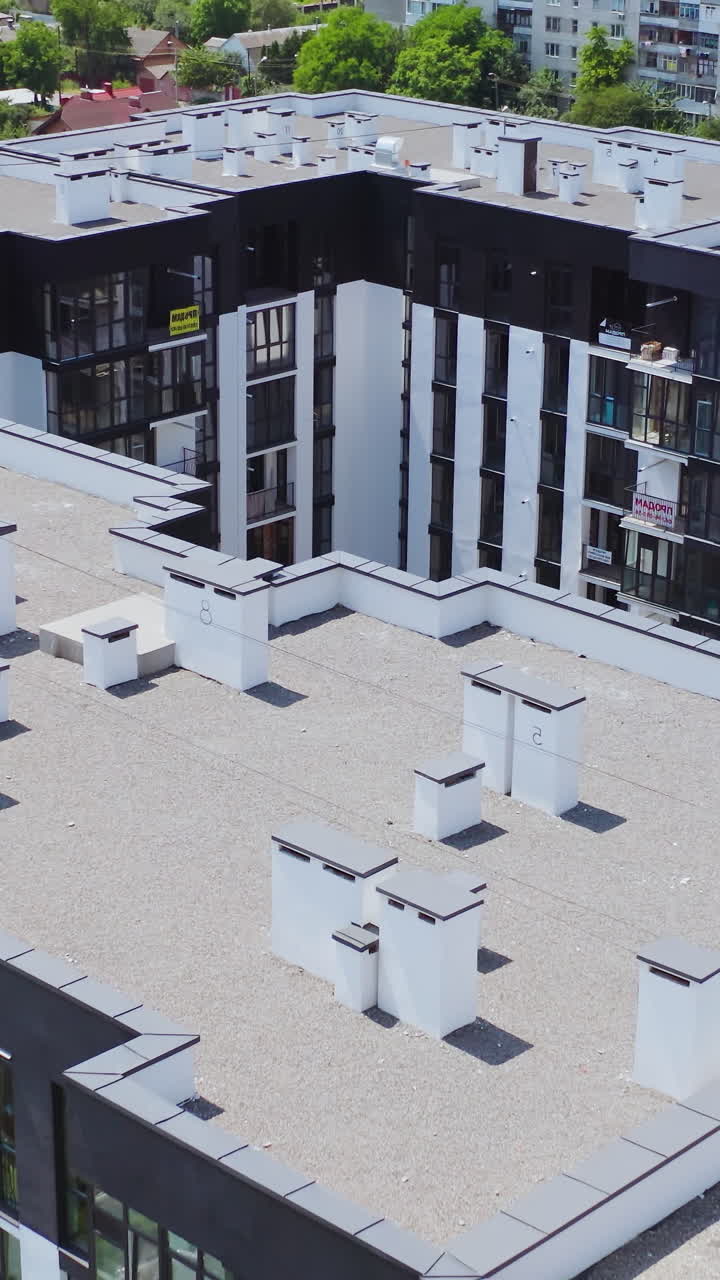 New Town Apartment Complex Landscape. Aerial view of neighborhood in residential area. Vertical video