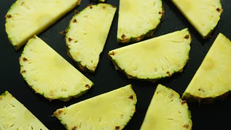 half cut pineapple pieces