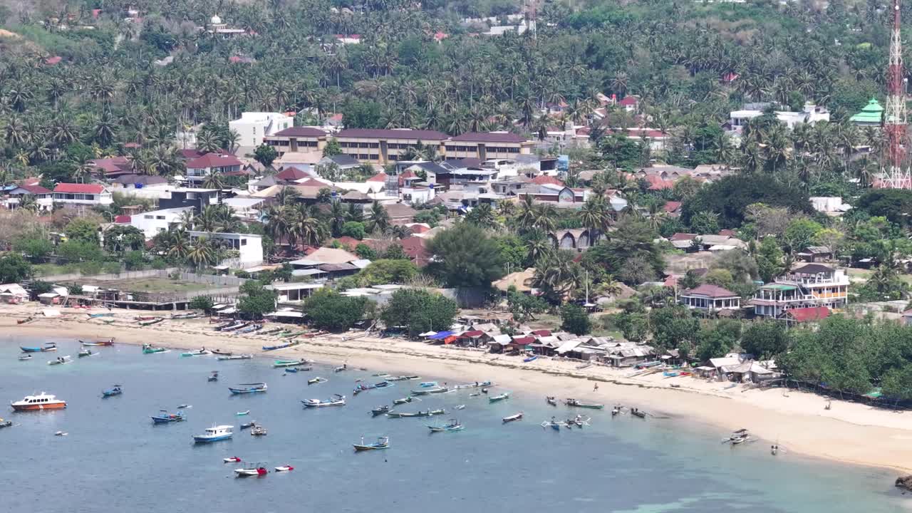 Beach in Kuta Lombok, aerial with boats and building and seafront. Indonesia travel