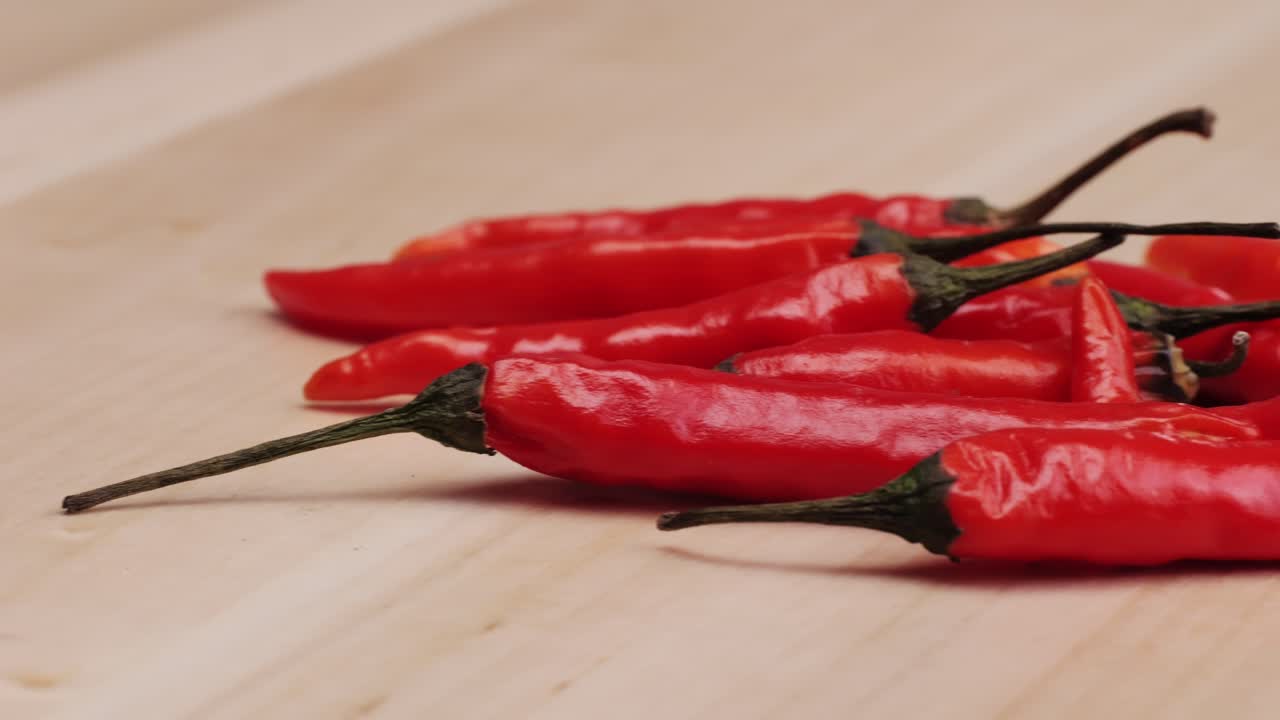 Red Chili Peppers on Wooden Surface