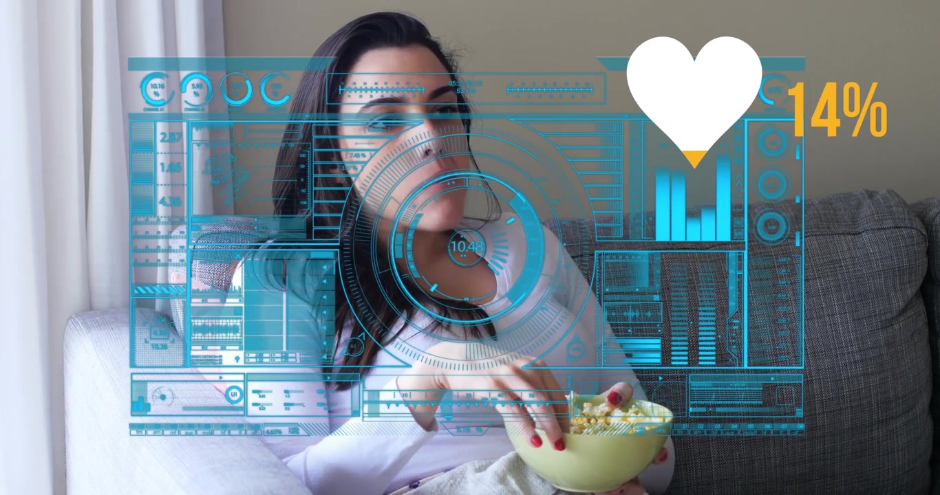 Animation of data processing with heart icon over caucasian woman eating popcorn sitting on sofa