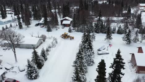 Drone-video-captures-the-power-and-a-snow-plow-in-action-as-it-clears-snow-in-the-winter-wonderland-of-Alaska