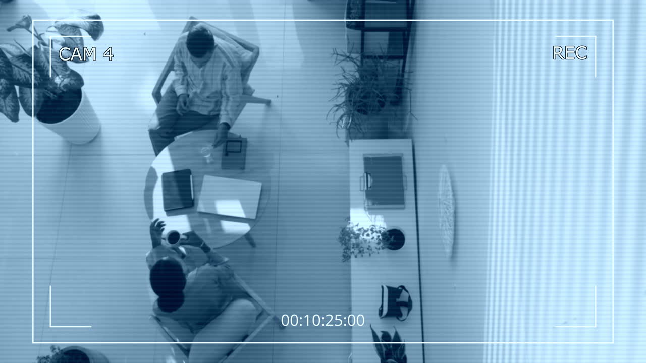 Business Partners Having Discussion at Coffee Break Hidden Cam
