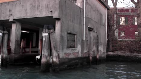 parked boat’s in venice italy, filmed from a boat