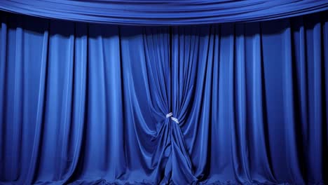 a blue curtain on a stage