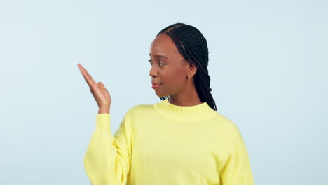 Studio-face,-comparison-and-black-woman-with-palm