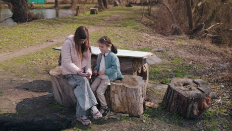 mother and daughter enjoying time in a park