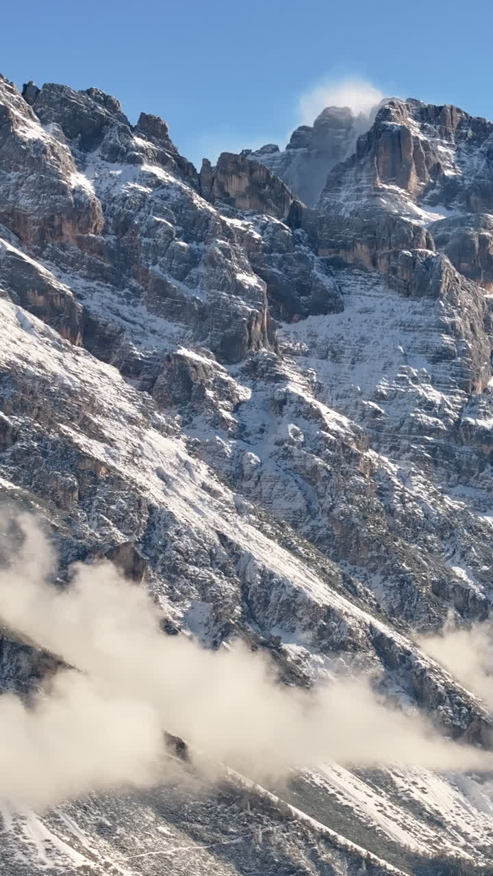Aerial drone view of the Cortina d'Ampezzo ski resort in the Dolomites, Italy. Vertical