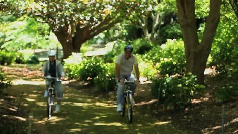 Old-woman-and-man-biking-together