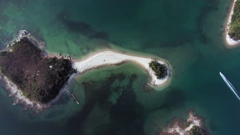 Pak-Sha-Chau-island-at-Hong-Kong-bay,-with-a-strip-of-sand-connecting-to-a-small-island,-Aerial-view