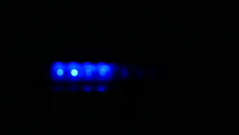 emergency red and blue police siren lights flashing shot out of focus 4k resolution