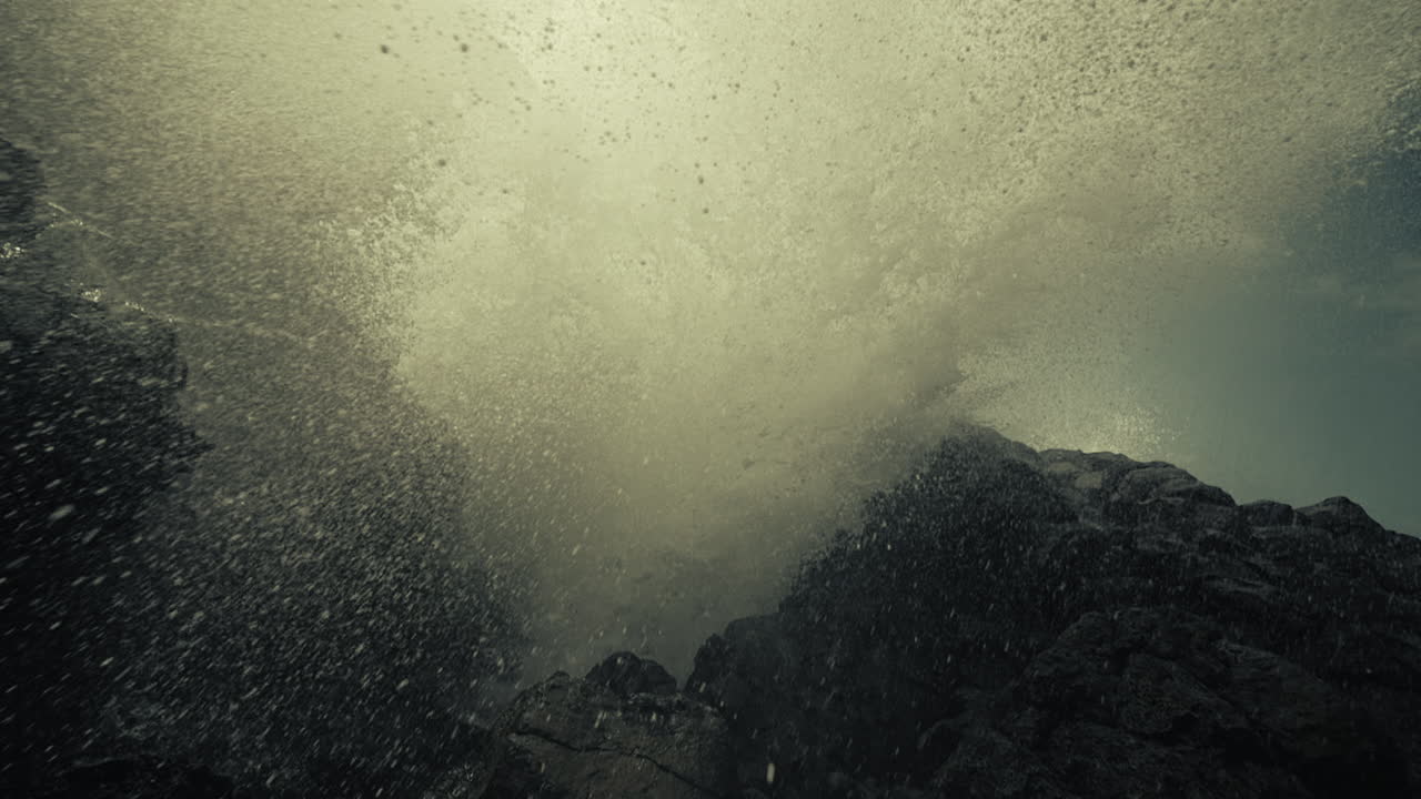 Powerful Waves Crashing Against Rocks