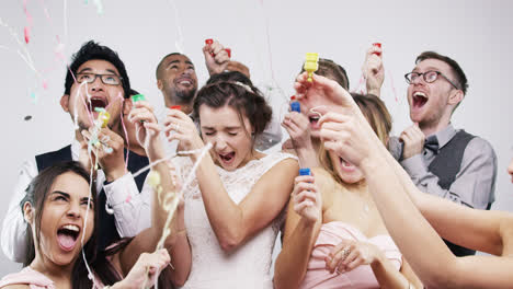 bridal party shooting poppers slow motion wedding photo booth series