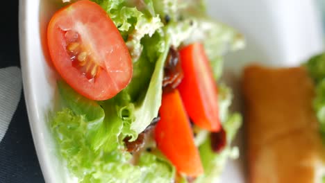 fresh salad with tomatoes and lettuce