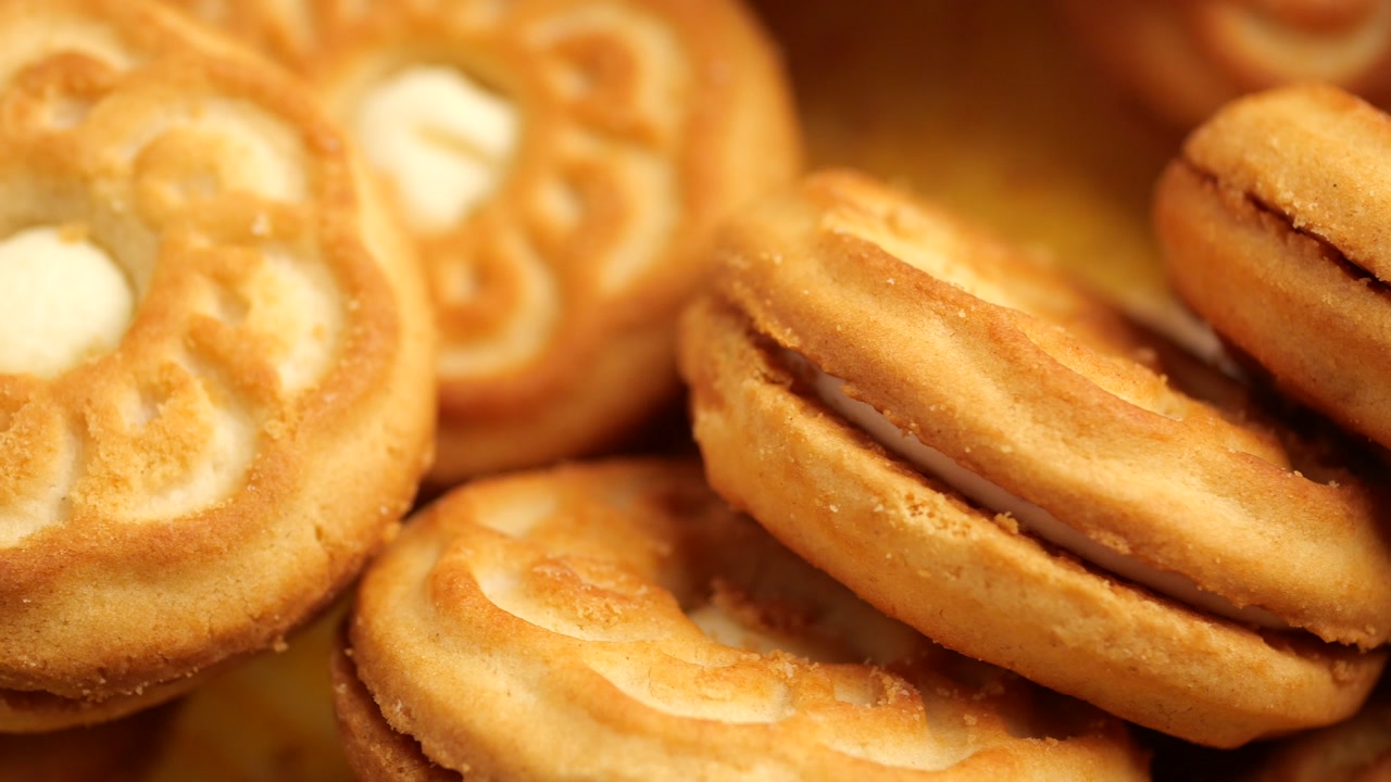 Close-up of Appetizing Golden Cookies with Cream Filling
