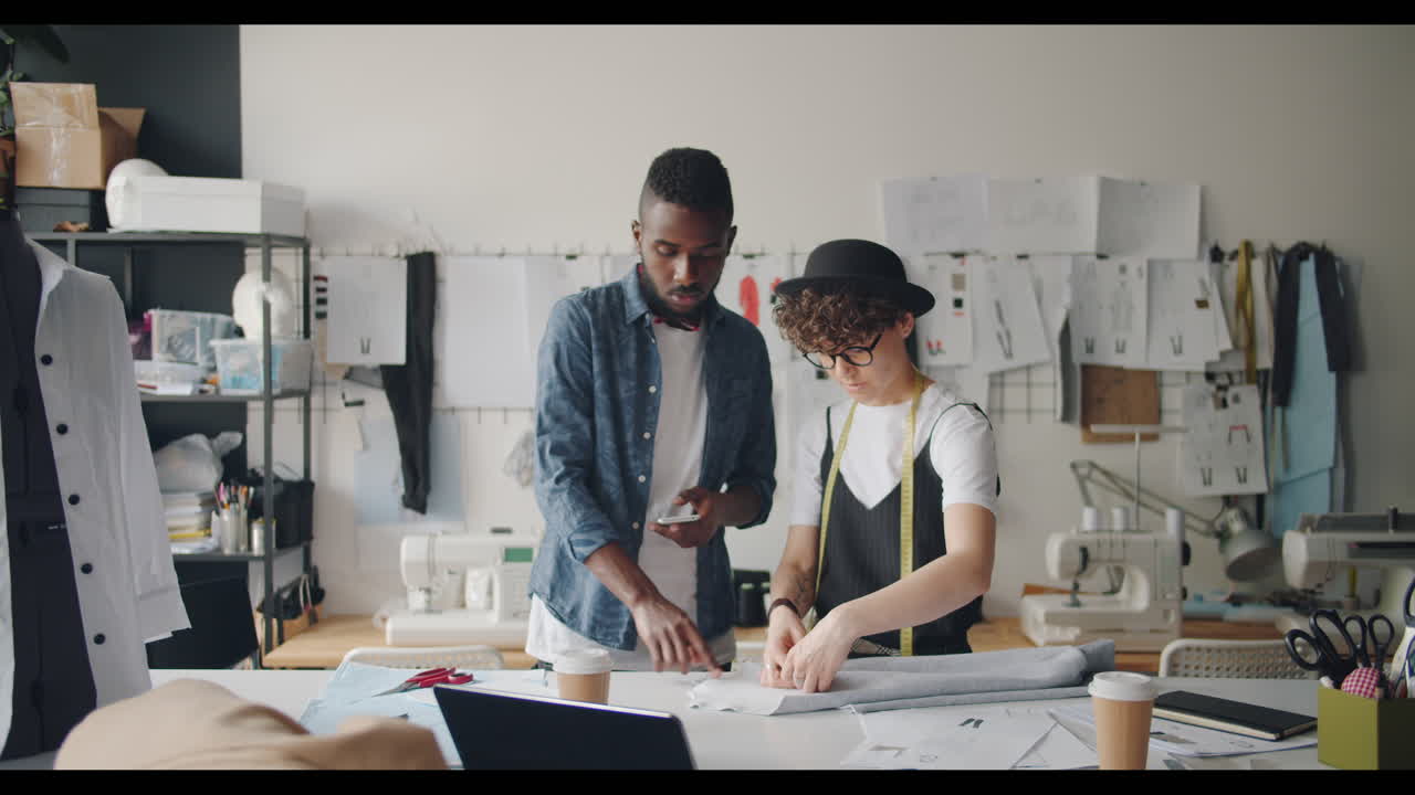 Fashion Designers Working in a Studio