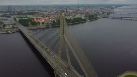 cinematic video of vanšu bridge and daugava riverside near rīga city centre - latvia
