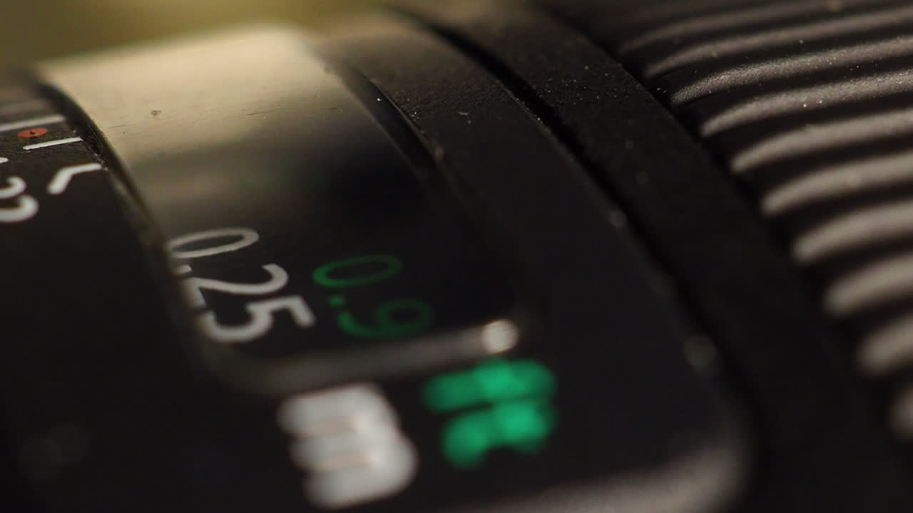 Slow adjusting of zoom and focus distance on dslr camera lens