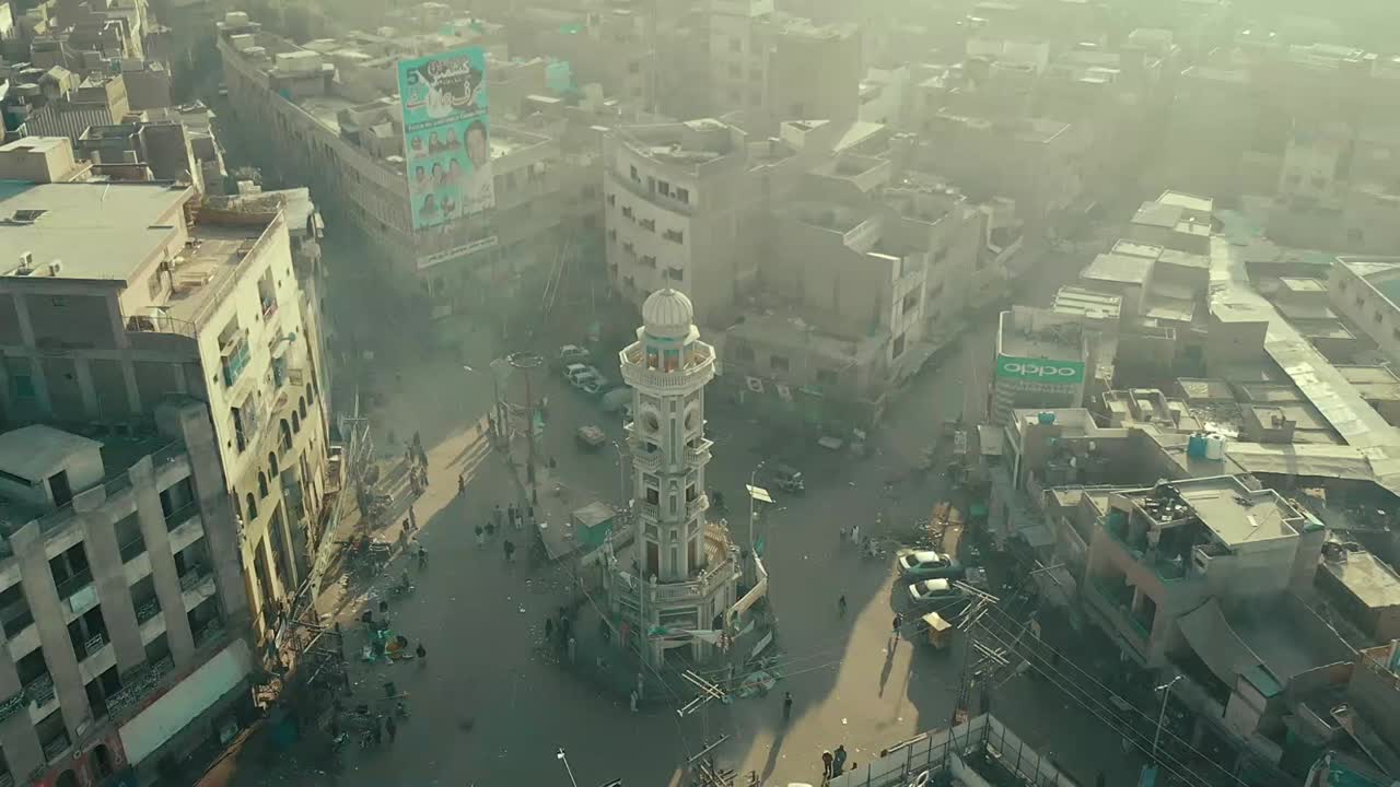 Aerial View Of Ghanta Ghar In Sukkur, Pakistan. Follow Shot