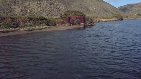 drone flight through rusty containers