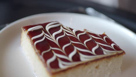 close up of a delicious cake with caramel and whipped cream