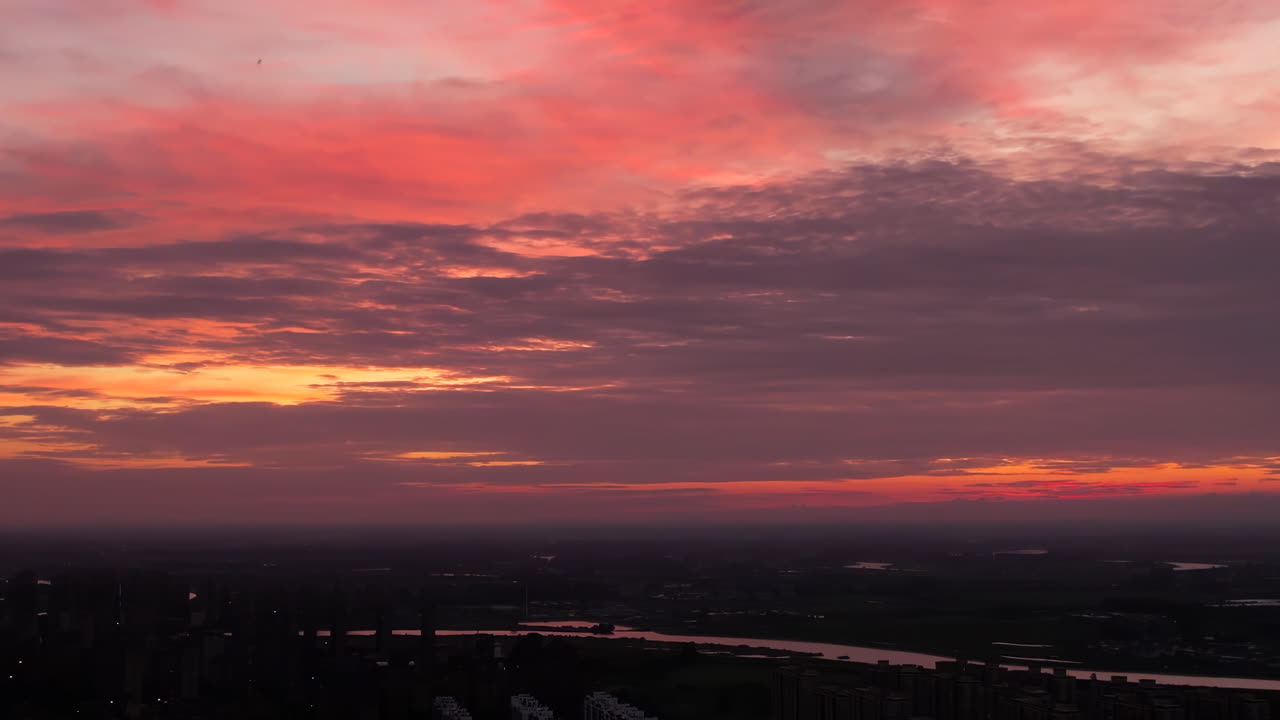 Spectacular sunset at the airport features cirrocumulus and beautiful sky with burning clouds a striking appearance resembling fire providing an ideal backdrop for a copy space image