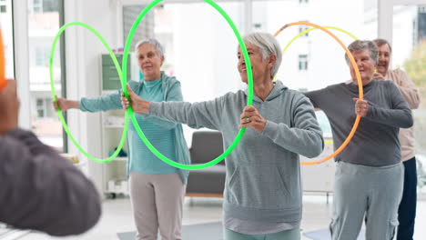 Senior-workout,-hula-hoop-and-people-with-coach