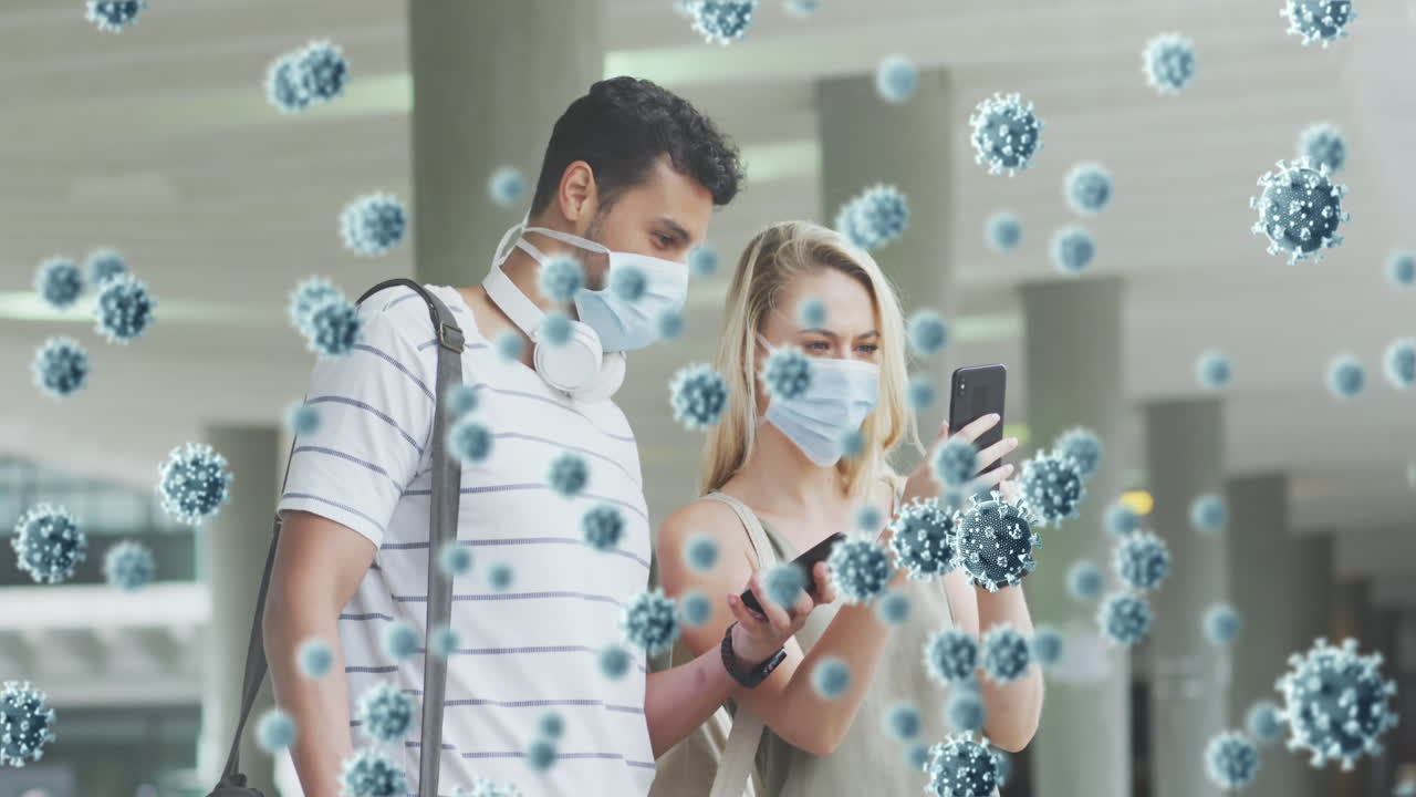 animación de células de virus sobre una pareja blanca que usa máscaras faciales usando teléfonos inteligentes