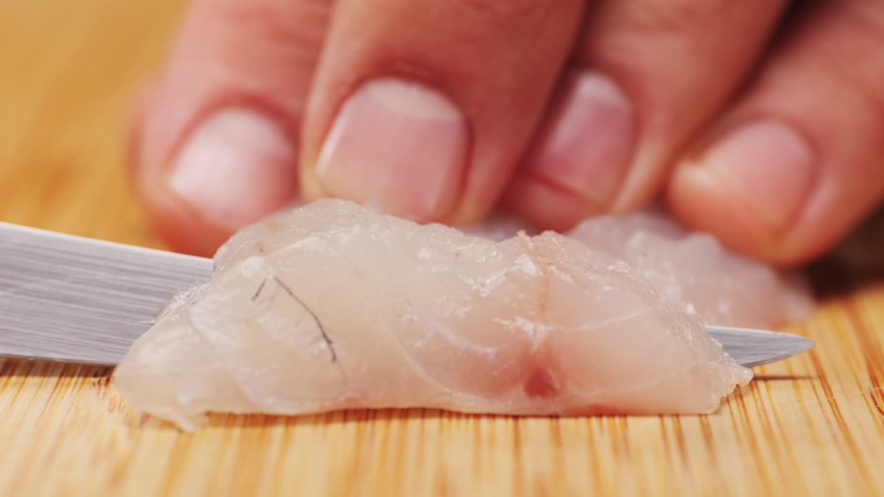 Cutting Fresh Fish Fillet