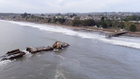 much of seacliff pier is gone in the aftermath of a storm in california, january 2023- aerial orbit