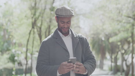 trendy man texting on a phone