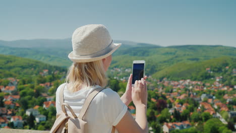 Woman-Takes-Photo-of-German-Village