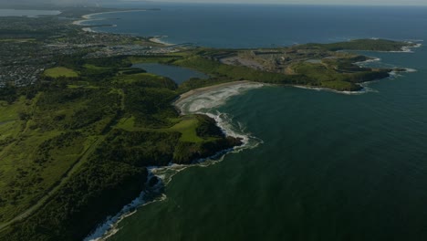 the farm surfing break mystics illawarra state park shell cove shellharbor marina waterfront aerial drone australia nsw sydney aus uni wollongong south coast mining coastal sunny blue sky forward pan