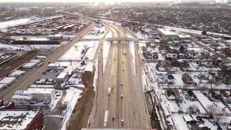 interstate 75 going through suburbs of detroit, aerial drone view