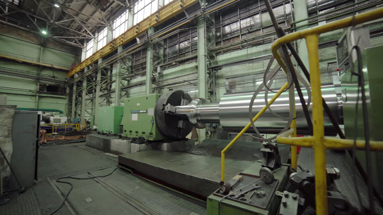 Metal Bar Being Machined in a Factory