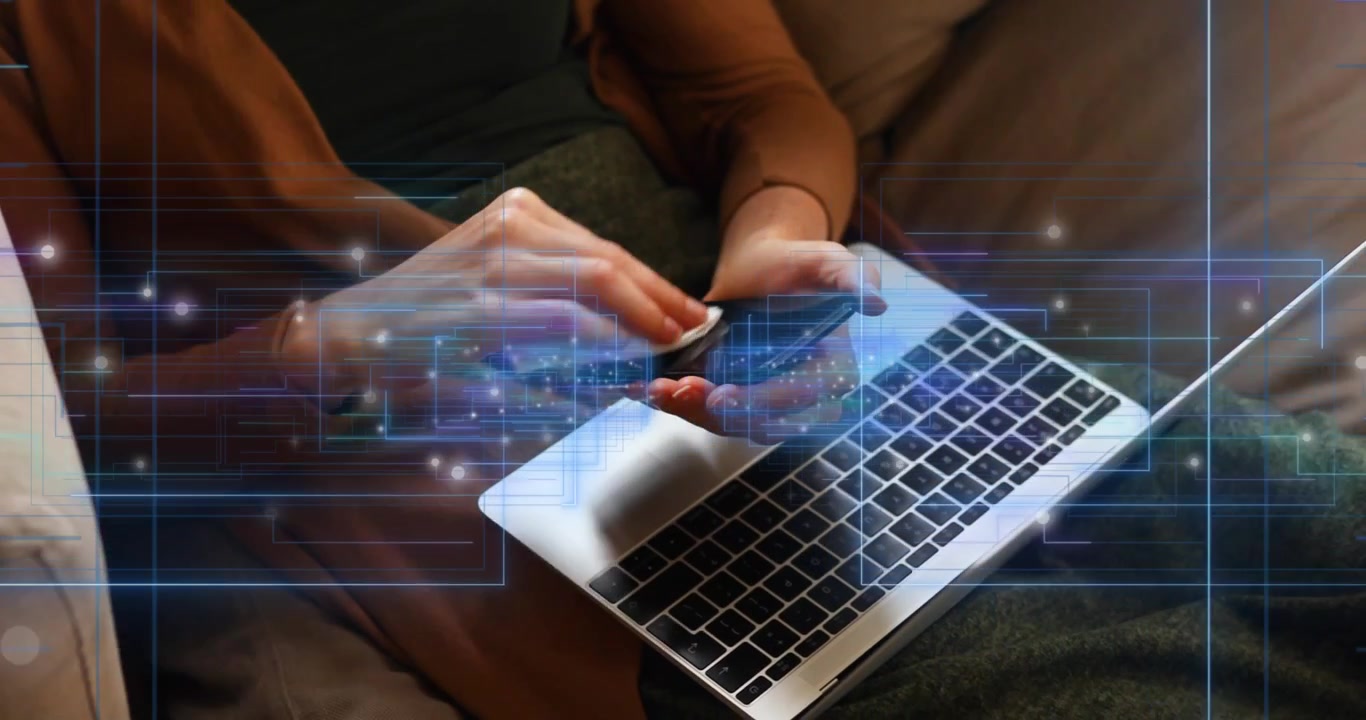 Animation of empty interface screens and data processing over woman with laptop cleaning smartphone
