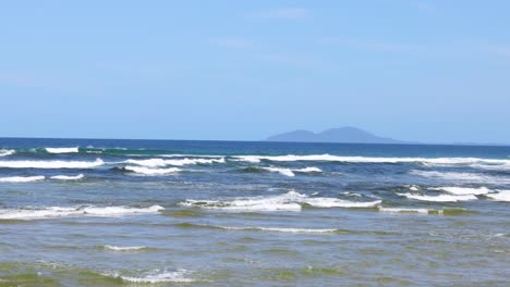 peaceful waves rolling onto a sandy beach