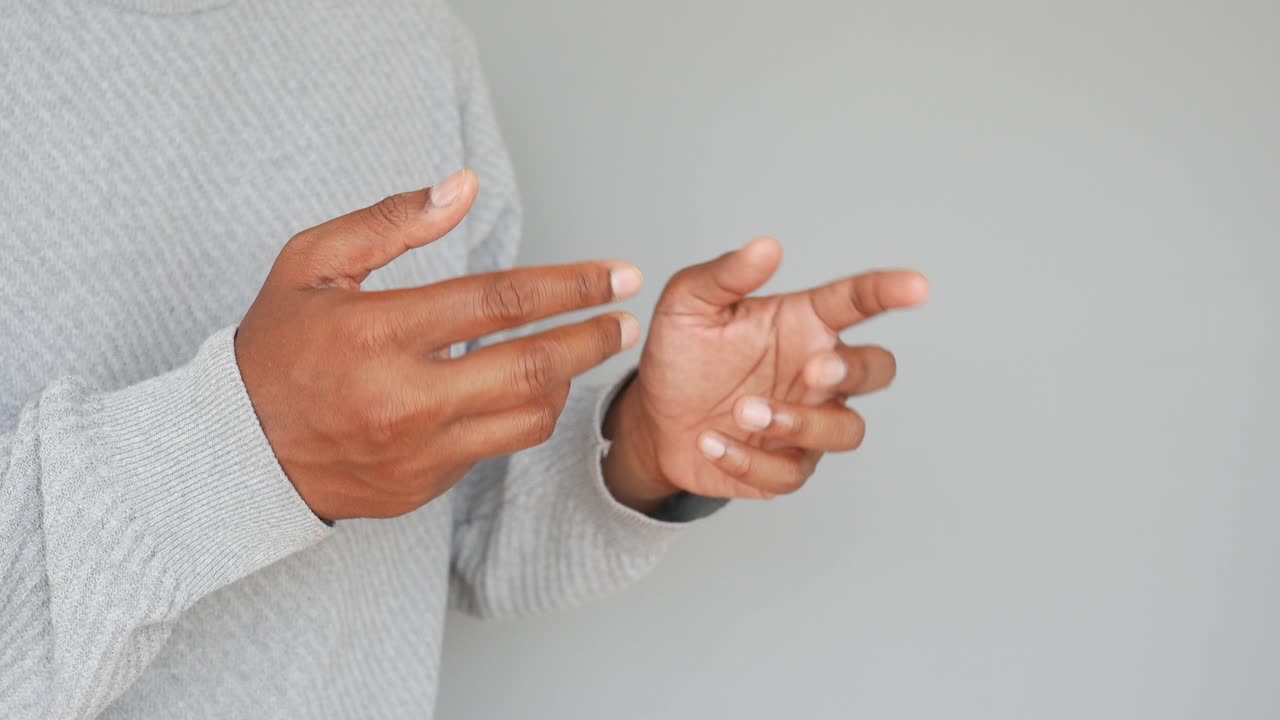 Person with clenched fists