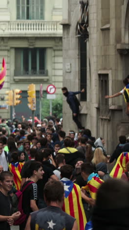 barcelona - spain - october 18 2019 : riot police clash with protestors at the general strike in via laietana, barcelona in vertical