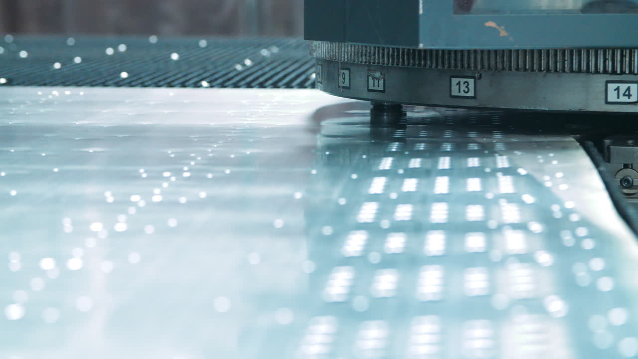 Stamping press working in metalworking workshop. Industrial press