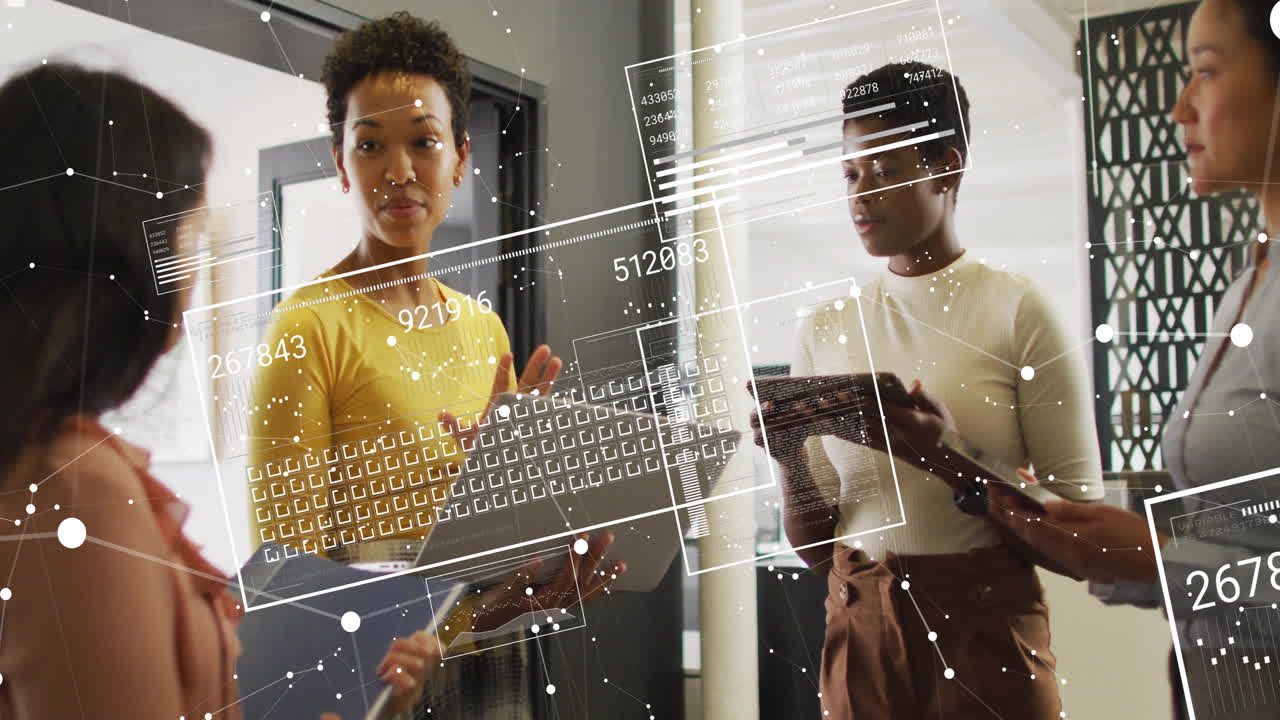 Animation of screens with data processing over diverse business people in office