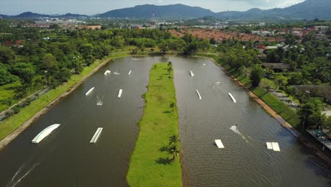 sunny day phuket island famous kathu wake park aerial panorama 4k thailand