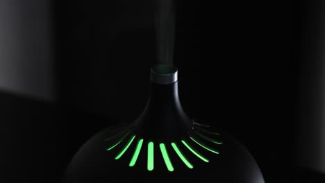 modern black essential oil diffuser with light display