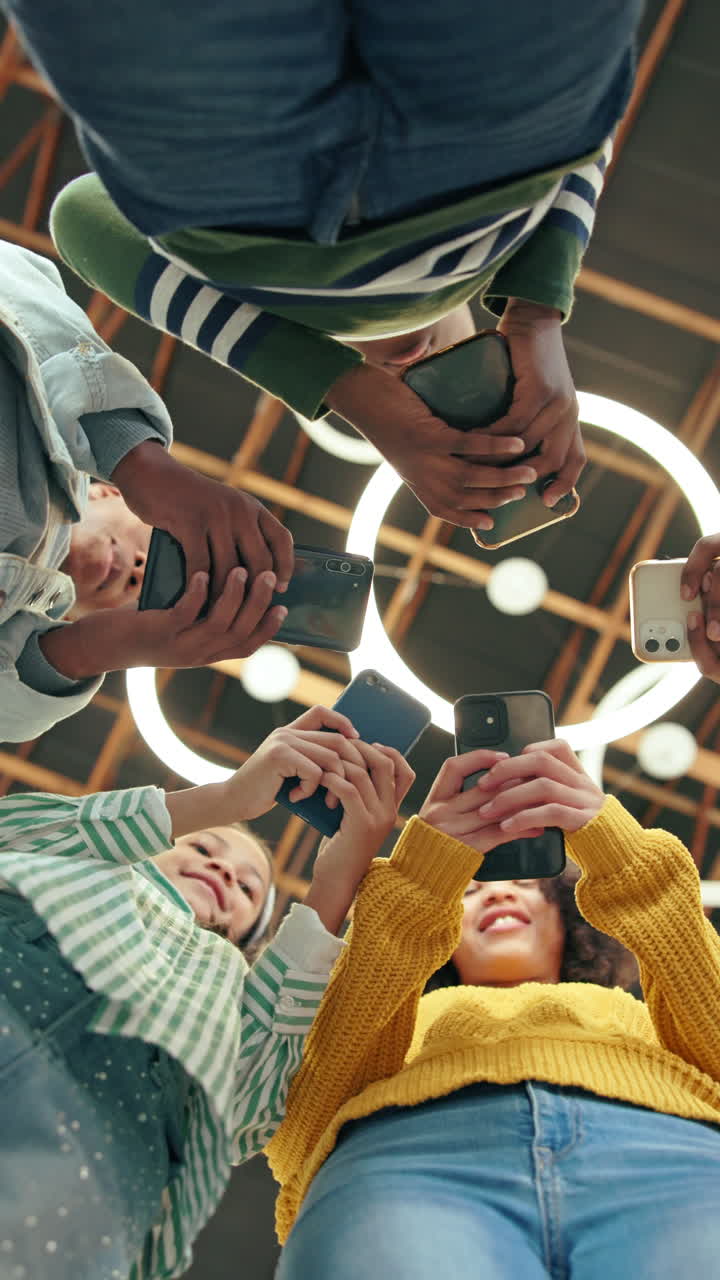 Diverse Group of Young People Looking at Smartphones
