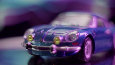 close-up of a blue toy car with dreamy bokeh background
