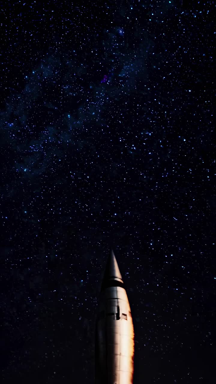 Low-angle shot of a futuristic rocket against a dark sky, emphasizing sleek design and power