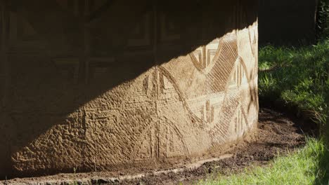 Geometric-designs-etched-into-plaster-wall-of-Lesotho-round-house