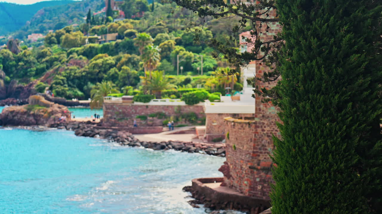 Blurred view of the Chateau de la Napoule Castle in Mandelieu-La Napoule, France on the shore of the Mediterranean Sea