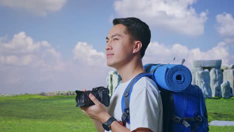 man taking pictures of stonehenge