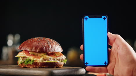 burger and smartphone